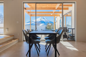 Dining area and view of Mt. Fuji from the window of the Suite at KANOA THE VILLAS – Mt. Fuji Lake Yamanaka